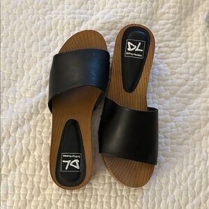 Dirty Laundry Black Slide Mules with Wood-Tone Footbed